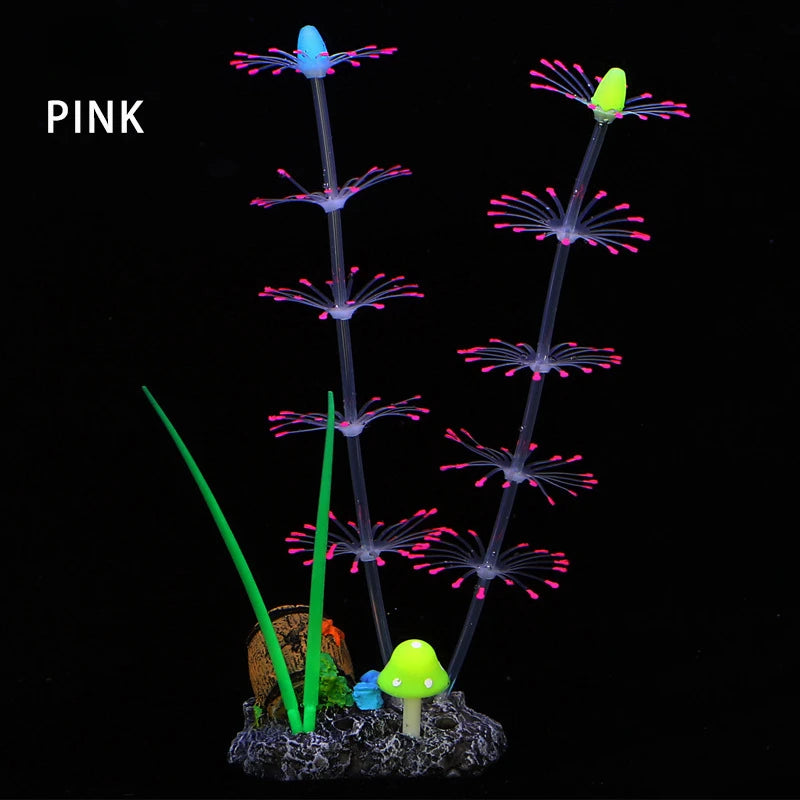 Tallo de hierba acuática de silicona fluorescente rosa creciendo de una roca con un hongo amarillo.