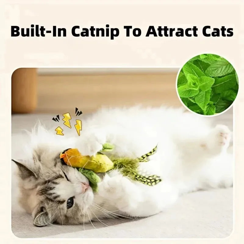 A white cat is interacting with a green catnip toy featuring an elastic rope.