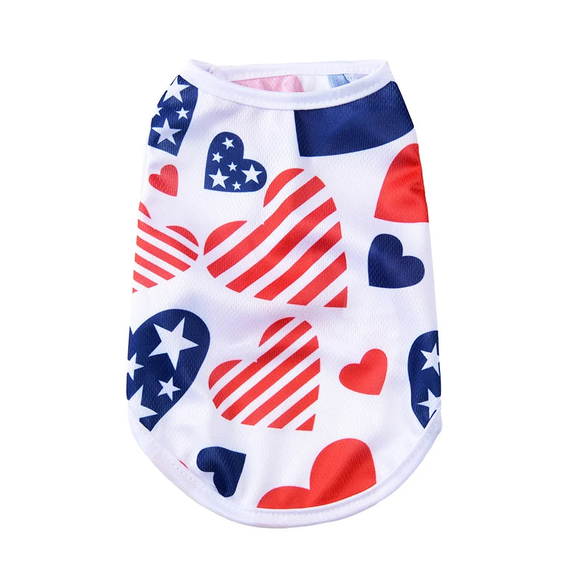 White pet vest featuring patriotic designs including stars, stripes, and hearts in red, white, and blue.