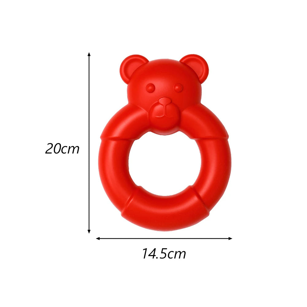 A bright red bear-shaped hexagonal TPR dog chew toy for dental health and interactive play.