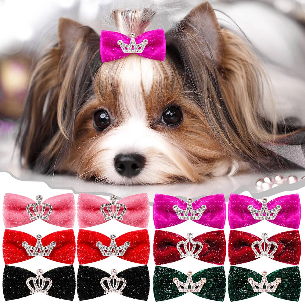 A collection of glitter dog bow hair clips in various colors and designs for pets.
