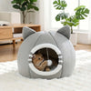 A gray plush tent house shaped like a cat cave with large ears, featuring an entrance for a small pet.