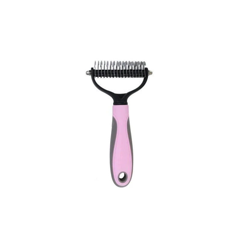 Brosse à pelage rose avec poils noirs et manche.