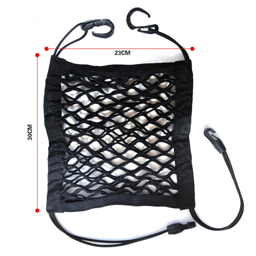 Black car dog barrier with automatic safety mesh storage bag featuring a handle and cord.