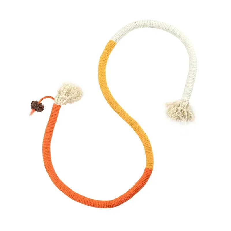 A silvervine-infused cotton rope teaser toy for cats with orange and cream colored rope and tassels.
