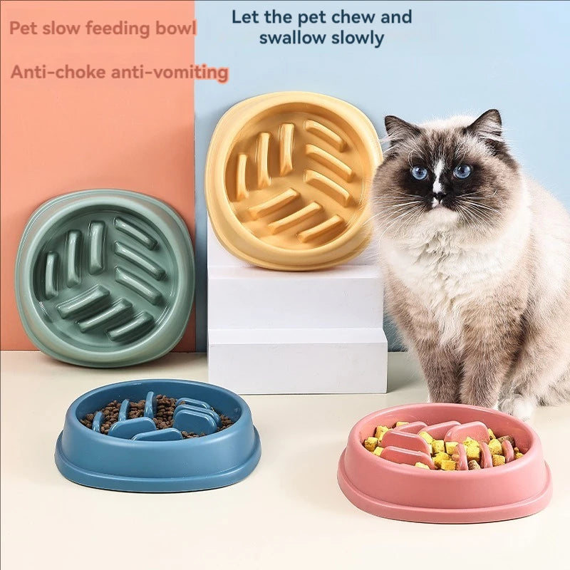 A set of anti-choke slow feeding bowls for pets, including silicone and plastic bowls in various colors.