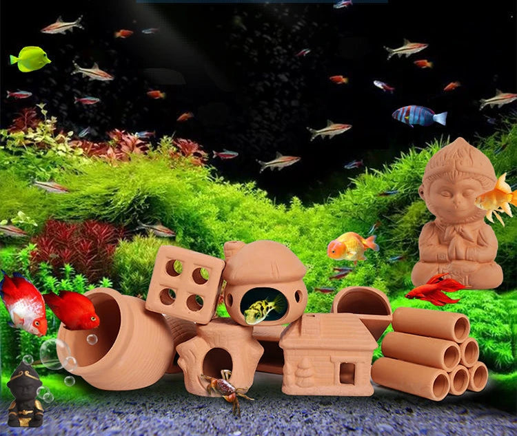 Natural clay aquarium cave decoration featuring various fish and shrimp models.