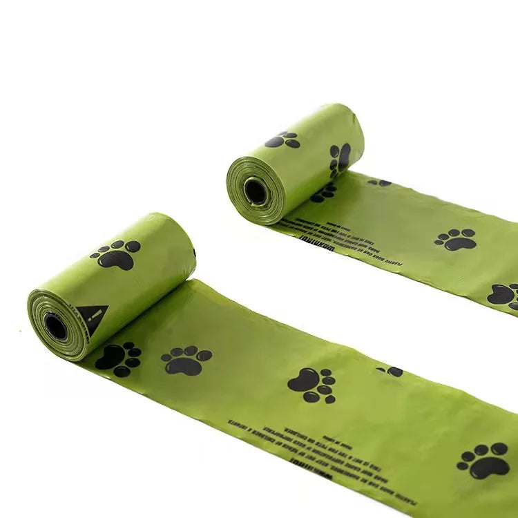 Rolls of biodegradable extra-thick dog poop bags in lime green color
