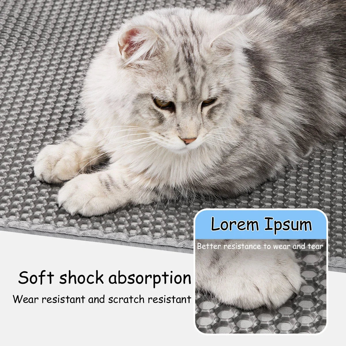 Ein flauschiger grauer Kater liegt auf einer grauen Matte, der weiche Stoßdämpfung und Abriebfestigkeit demonstriert.