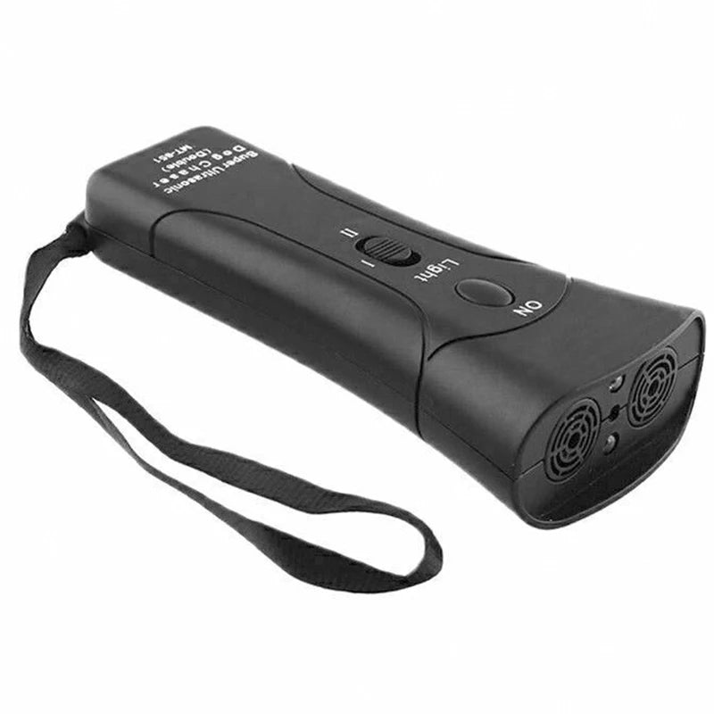 A black ultrasonic dog deterrent device with an on/off switch and a light function is shown.