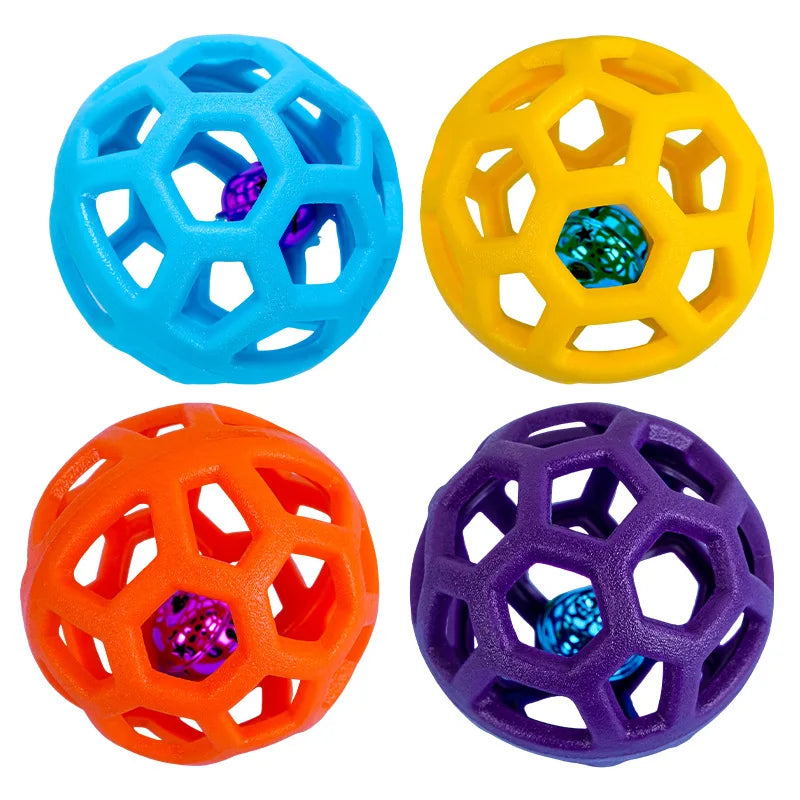 Four natural rubber dog chew balls in blue, yellow, orange, and purple.
