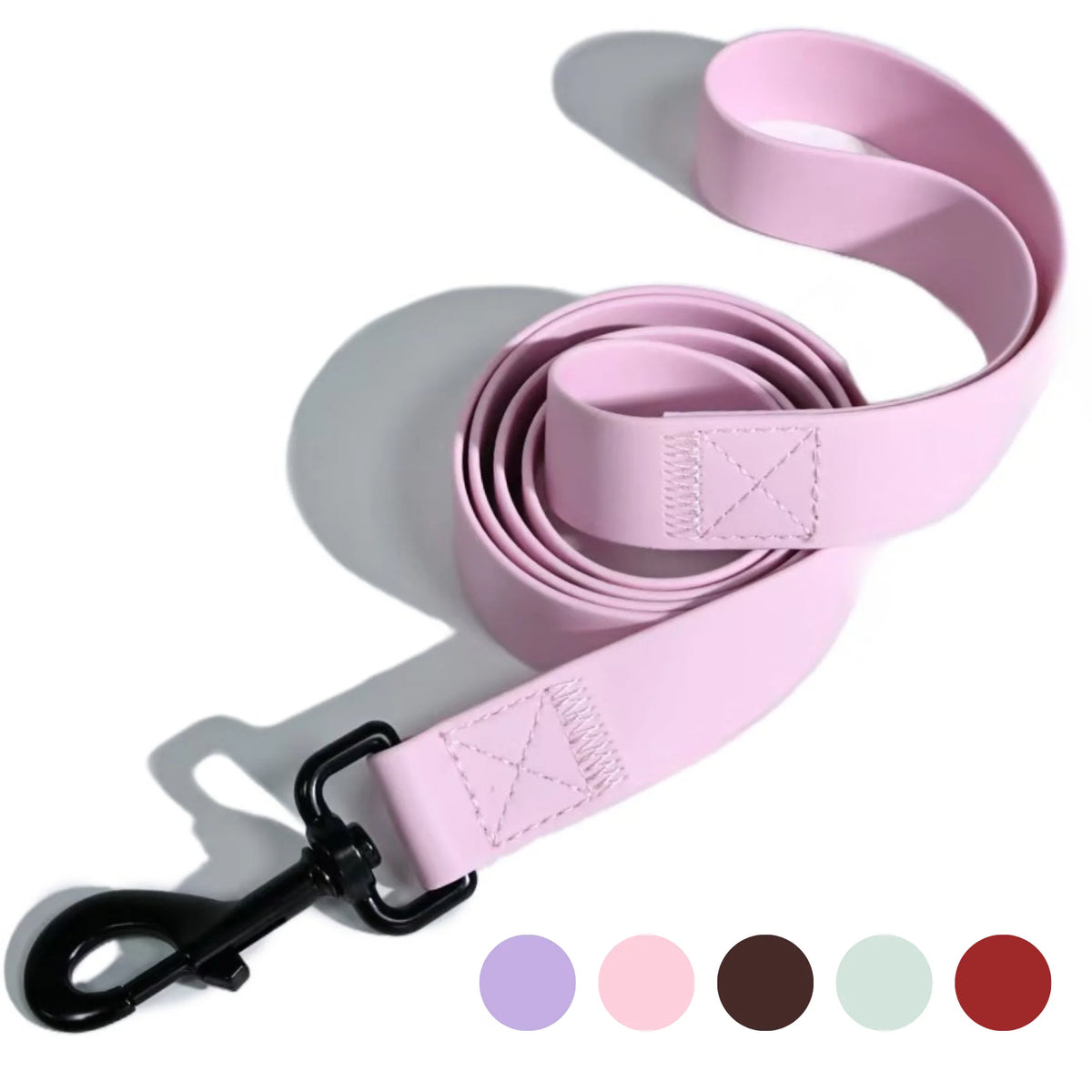 Pink waterproof PVC dog leash with a black clip shown coiled and uncoiled.