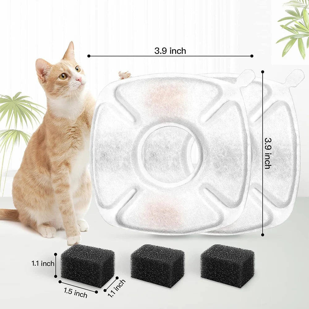 A set of three black replacement filters for a cat water fountain, shown next to a domestic cat.