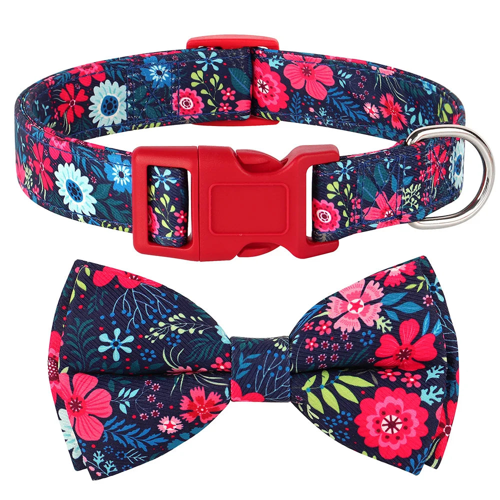 A floral nylon dog collar featuring a patterned fabric and an adjustable red buckle.