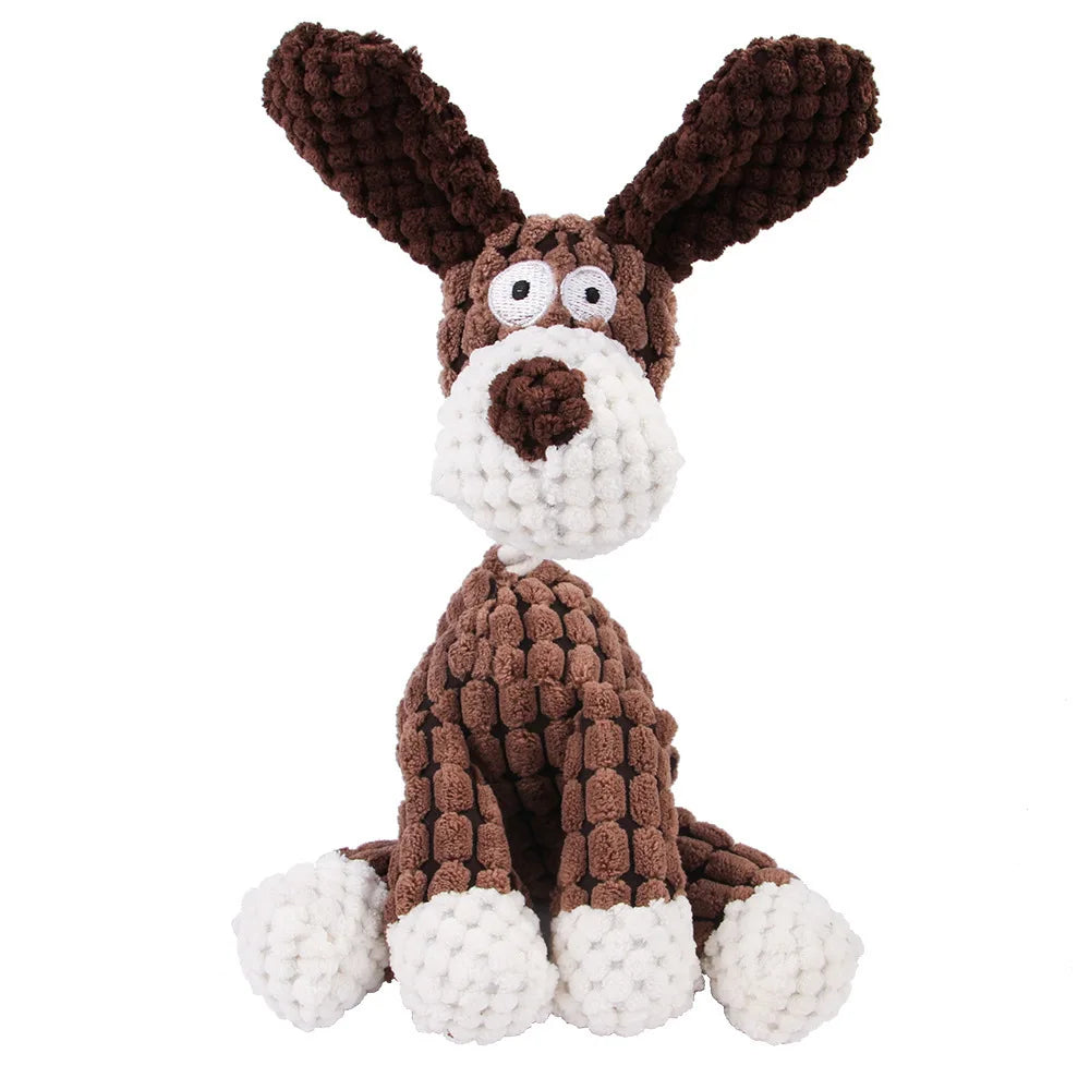 Jouet en peluche pour chien marron et blanc, ressemblant à un beagle avec de grandes oreilles tombantes.