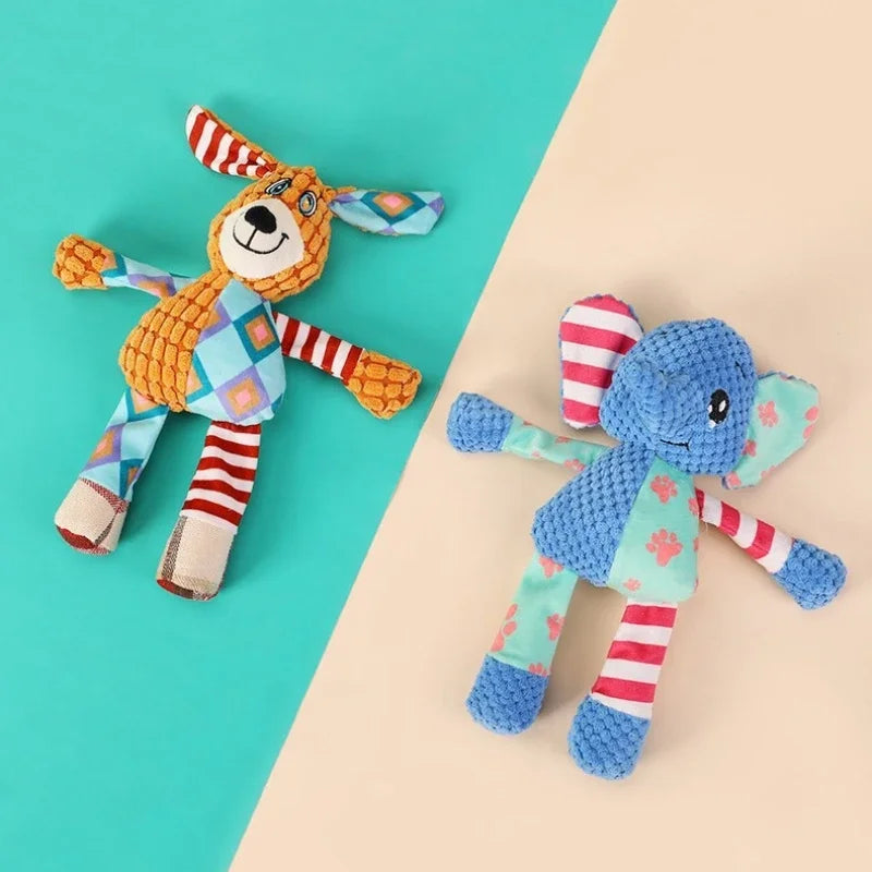 A plush dog toy featuring fox, elephant, and puppy designs in orange, blue, and pink fabrics.
