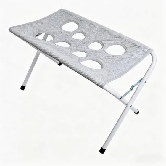 A white, foldable pet bathing stand with a mesh surface for cats and dogs.