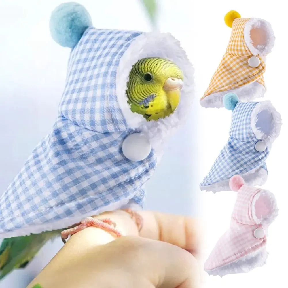A set of warm plaid parrot cape and hat featuring a yellow bird design.