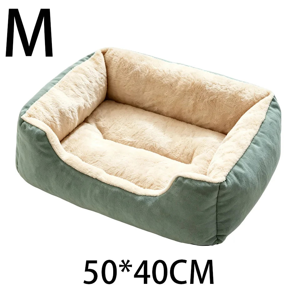 A rectangular plush pet bed in sage green fabric with a light beige sherpa lining and anti-slip base.