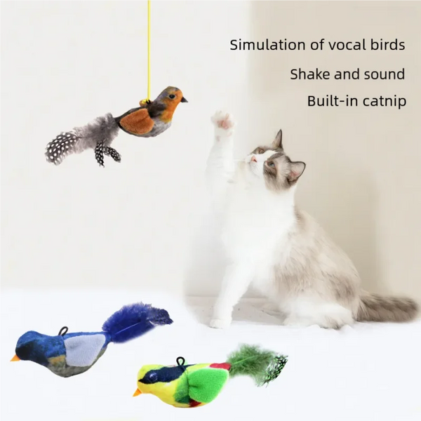 A cat interacts with a wall-mounted toy simulating vocal birds, including a built-in catnip feature.