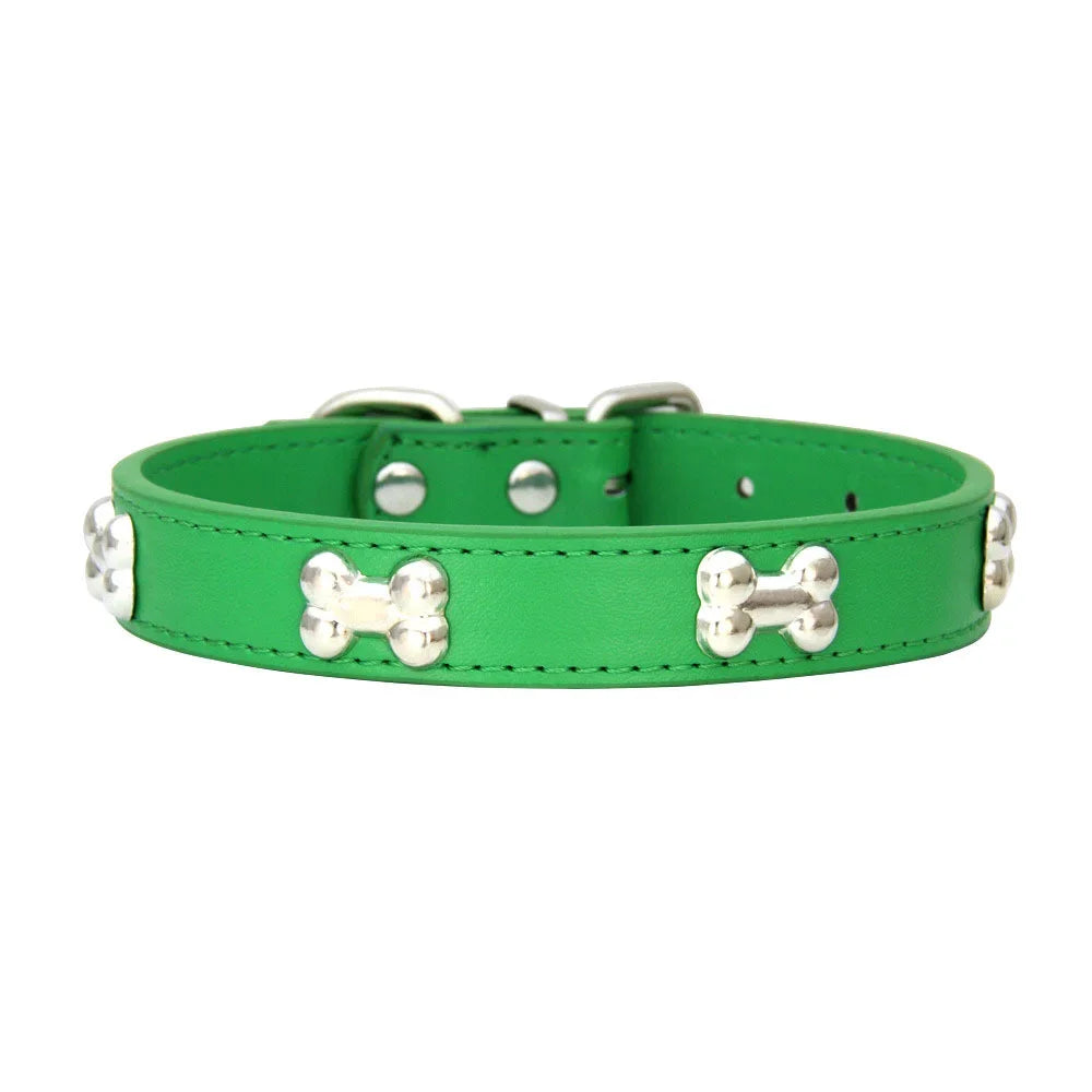 A bright green padded leather dog collar with silver bone rivets.