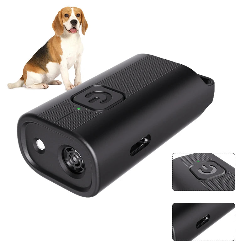 A black portable ultrasonic dog bark deterrent device next to a dog.