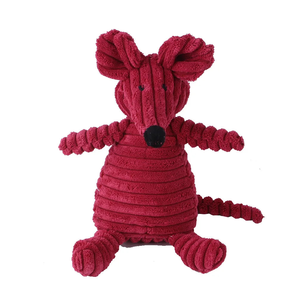A plush, animal-shaped squeaky dog toy resembling a red, textured fox or rodent.