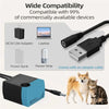A black low-voltage submersible pump is shown connected to a power cord, with a dog and a cat nearby.