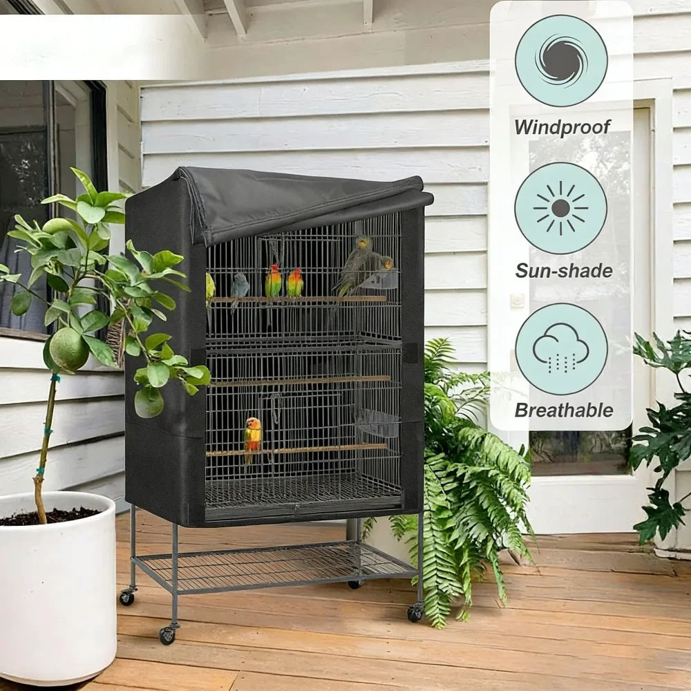 A black bird cage cover with a wire mesh interior is displayed on a wooden deck next to potted plants.