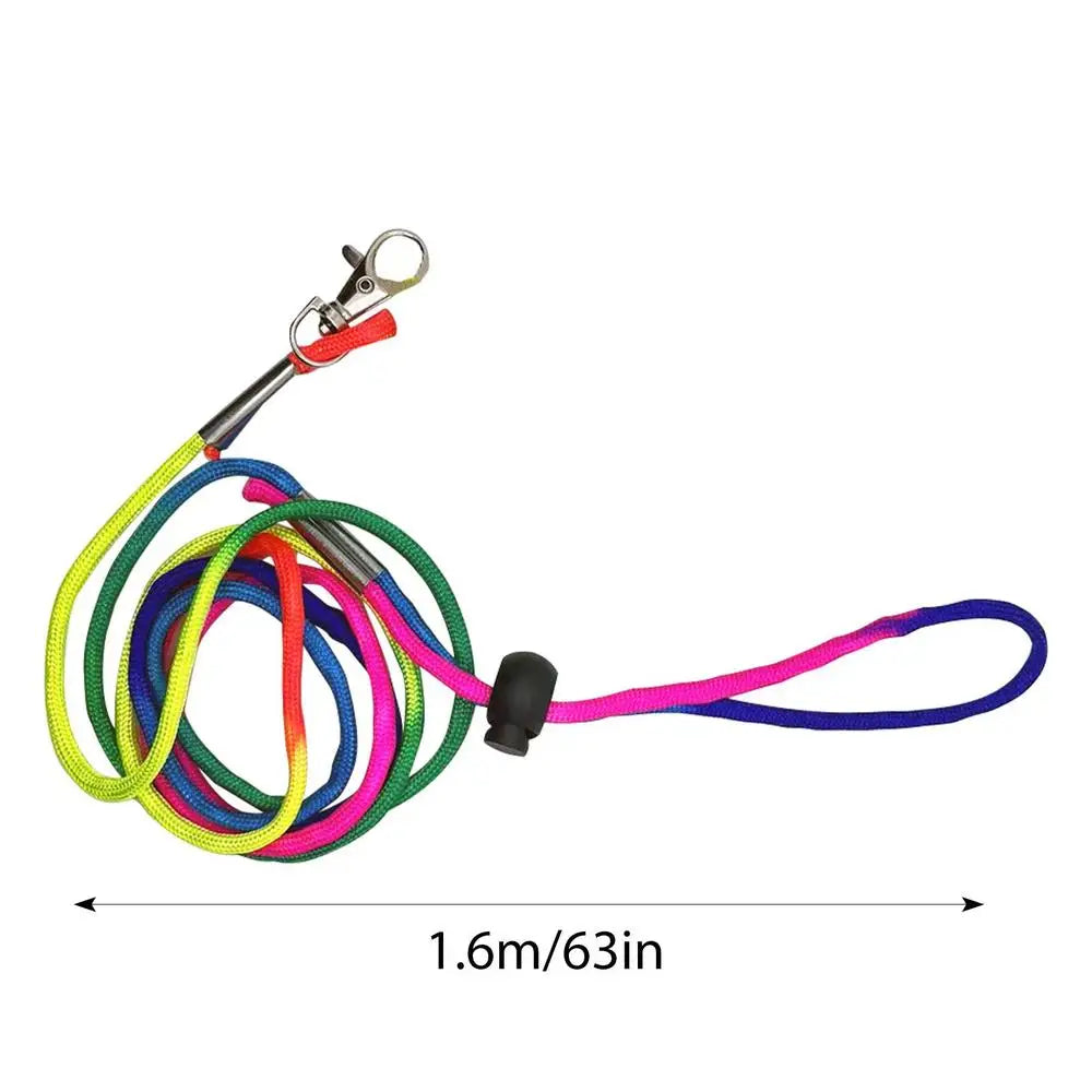 A coiled soft reusable parrot flight suit with bright colored cords and a metal clip.