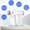 A white portable USB rechargeable nano hairspray steam gun with a clear water tank and a handheld nozzle.
