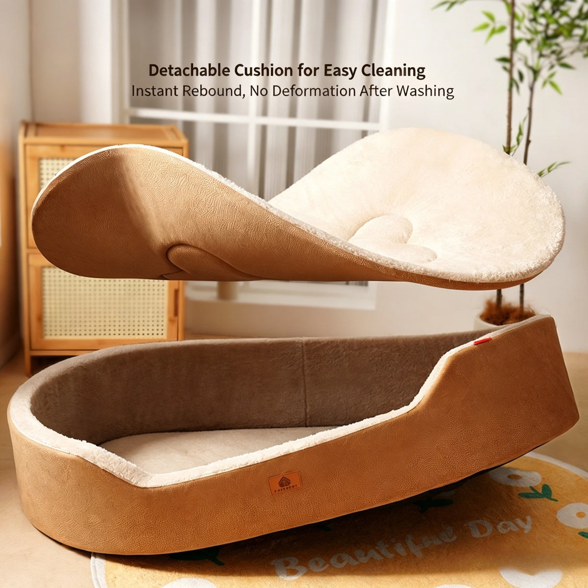 A tan dog house bed with a removable cushion is shown on a light wooden shelf.