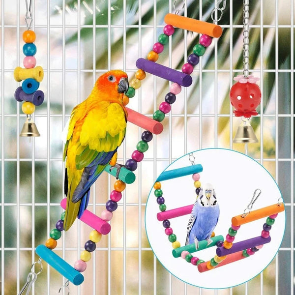 A colorful wooden swing toy with various colored dowels and beads hanging in a wire cage.