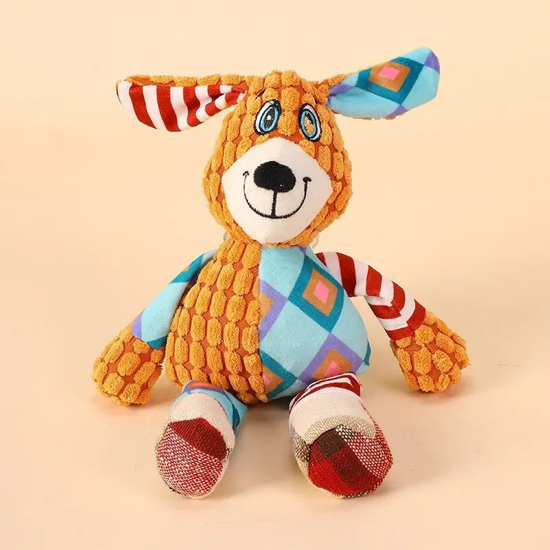 A plush dog toy featuring a fox design with orange fur, blue accents, and striped ears.