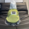 A light green hooded coat for a small dog resting on a dark leather couch.