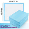 A stack of 30 disposable underpads or bed pads in light blue color, measuring 13x17 inches each.