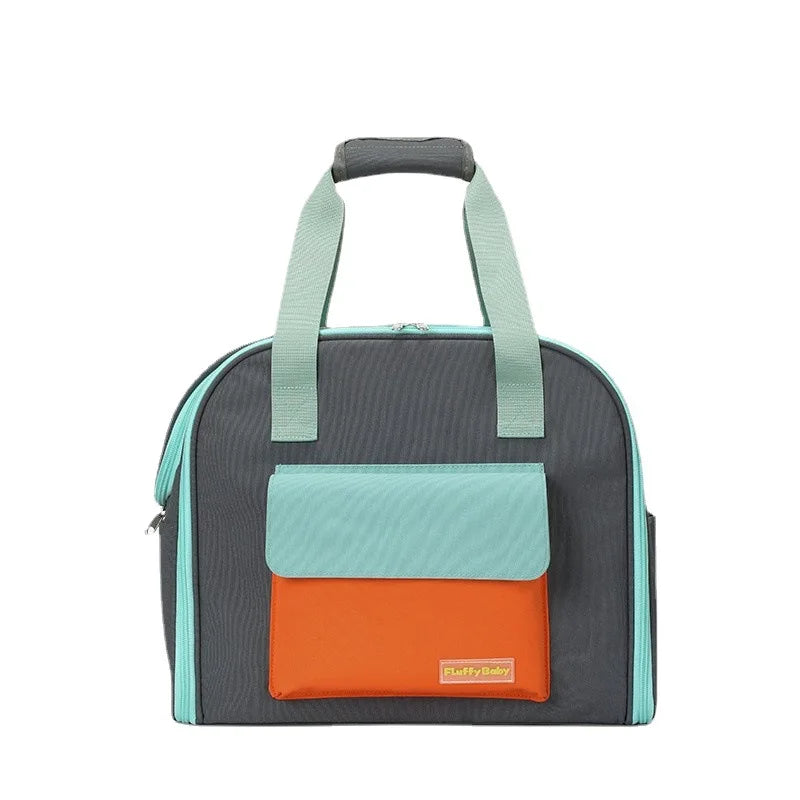 A gray breathable pet carrier backpack with a light teal pocket on the front.