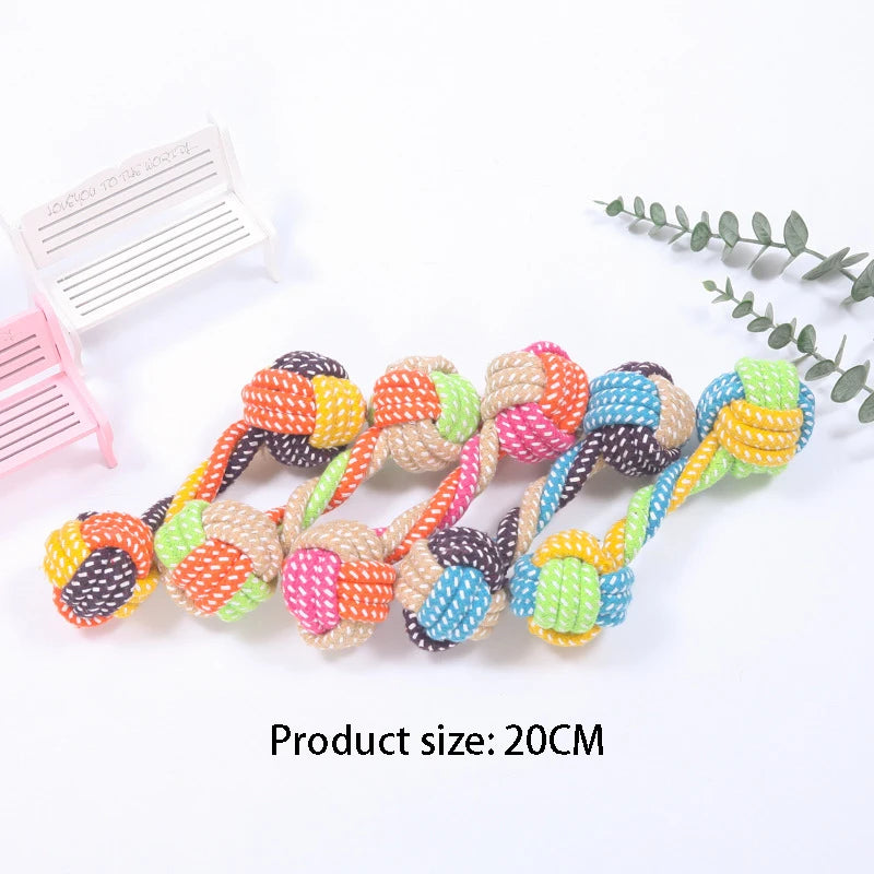A colorful, textured hemp rope chew toy for dogs with various knots and colors.