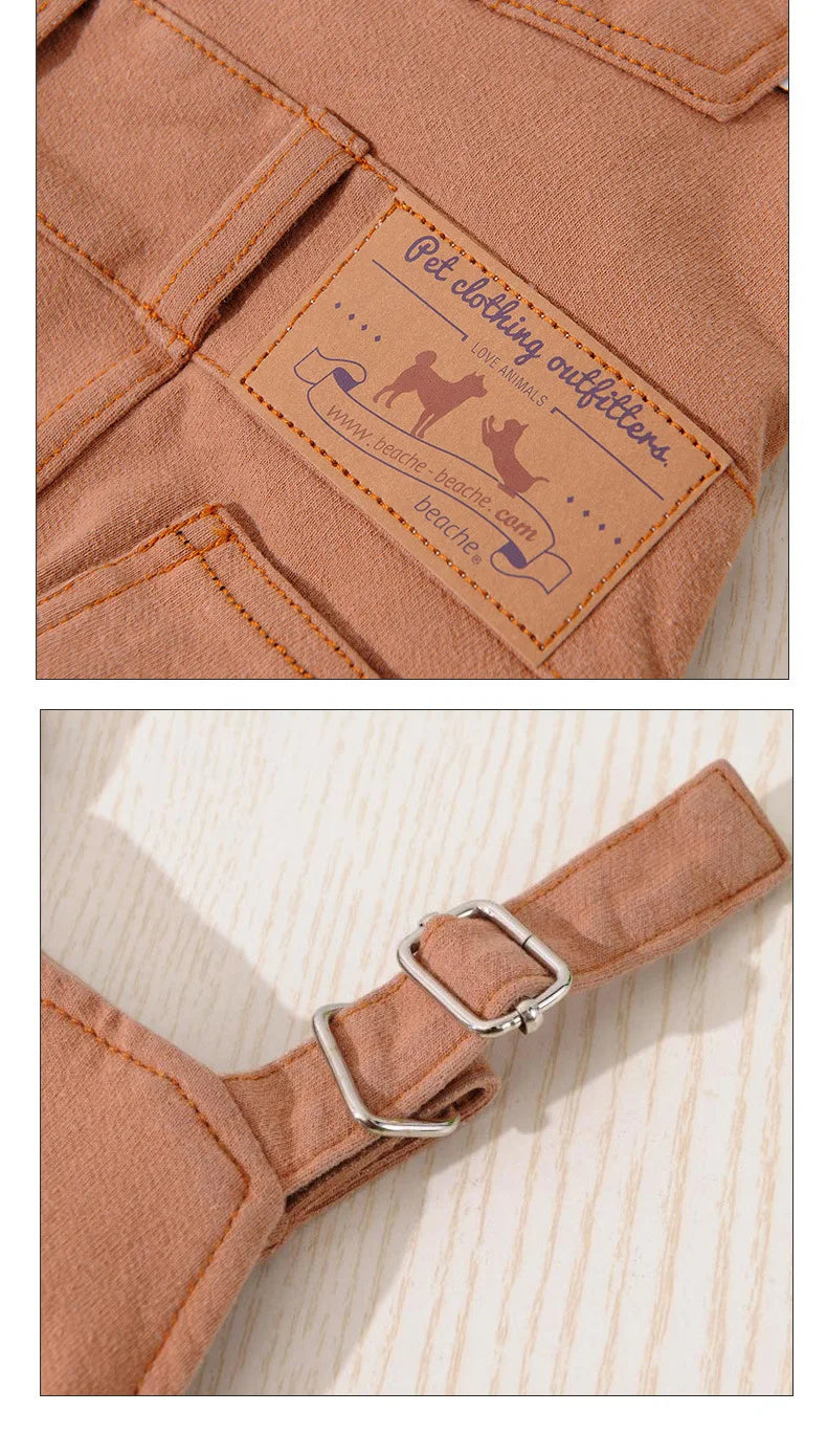 Close-up of a tan dog denim jumpsuit featuring a branded patch and a silver buckle detail.