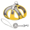 A yellow reflective adjustable dog harness and matching leash set with silver hardware.