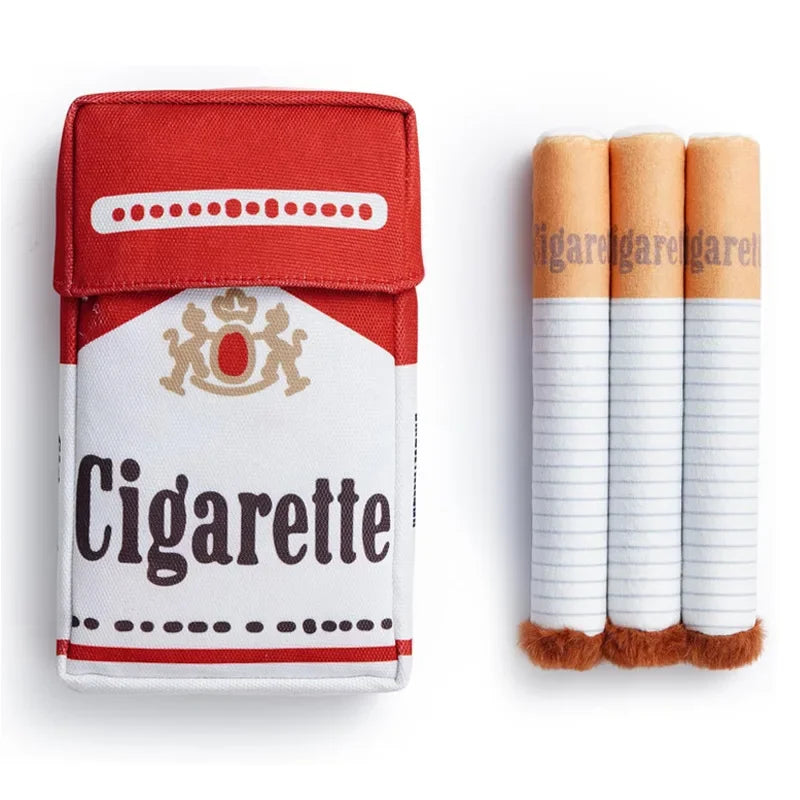 A red and white fabric case for a cigarette, next to three cylindrical tobacco sticks.