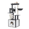 A wooden cat tower featuring a litter box enclosure, scratching posts, and a platform for a cat.