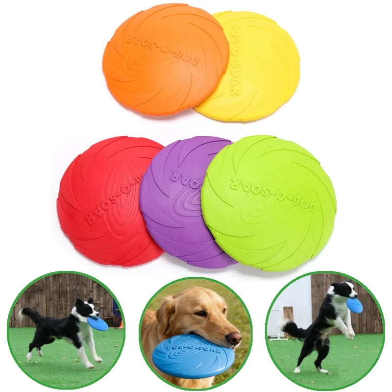 A collection of orange, yellow, and pink silicone flying discs for dogs, with some discs being played by a dog.