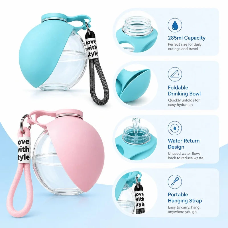 A pink portable dog water bottle with a clear dispenser and a hanging strap is shown.