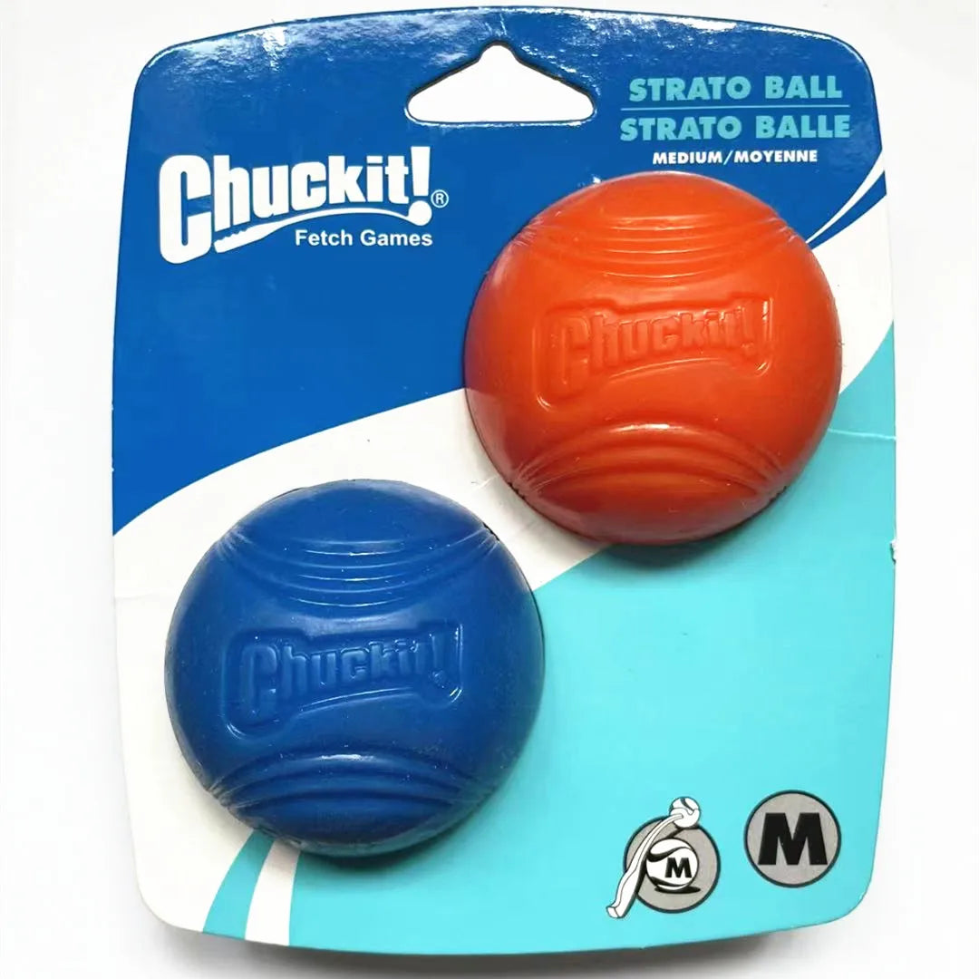 A package containing two orange and blue Chuckit balls for fetch games.