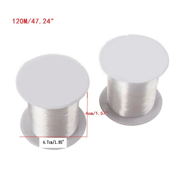 Spool of transparent nylon moss line for aquariums with a white cap and measuring markings.