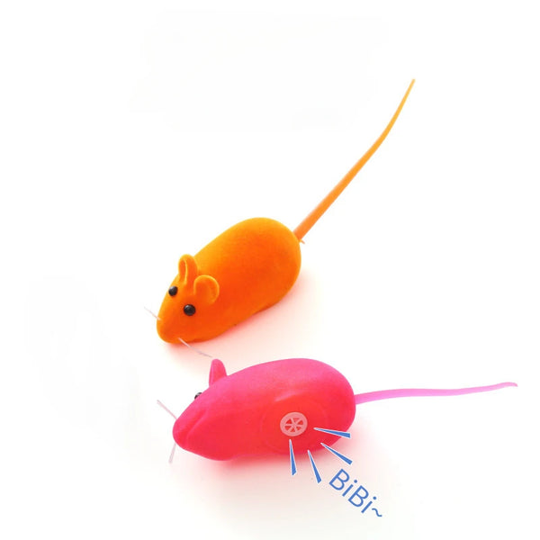 An orange interactive squeaking mouse toy with a long tail and a pink mouse toy.