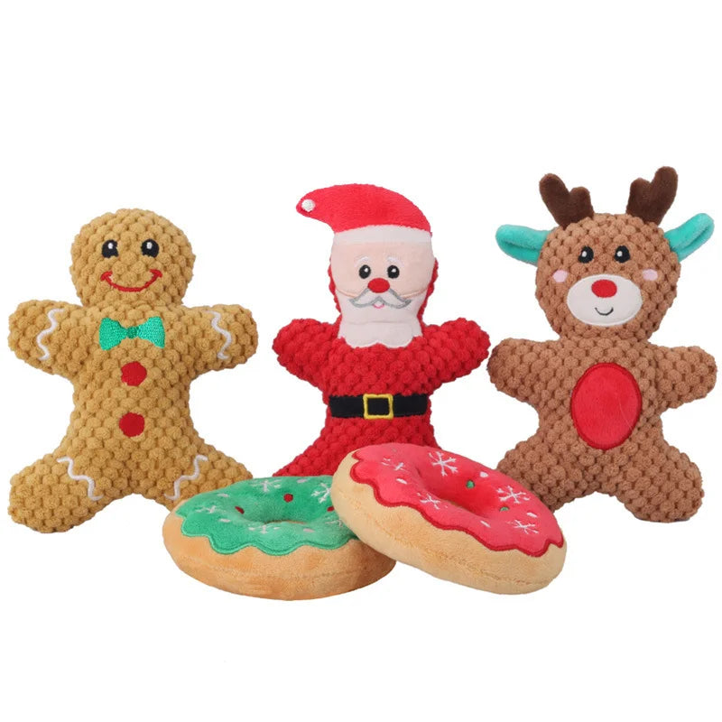 A collection of holiday plush toys featuring a Santa, an elk, a gingerbread man, and a donut design.