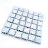 A square cooling mat for small pets made of translucent white and blue patterned tiles.