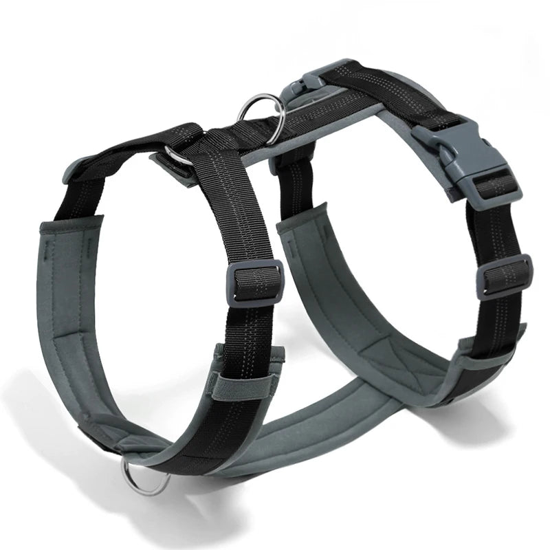 A gray adjustable no-pull reflective dog harness with an H-shaped design shown against a white background.